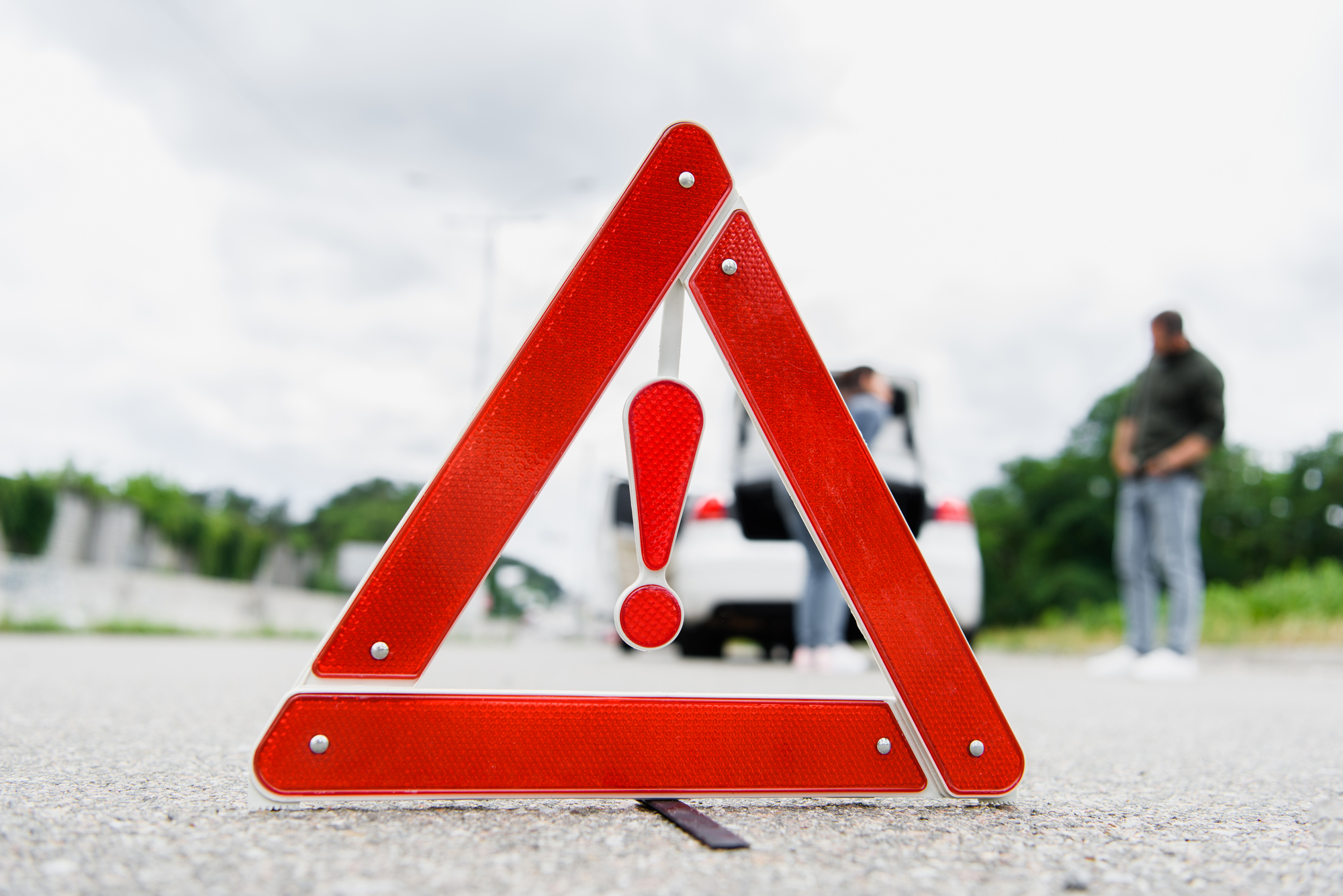 Car Accident Lawyer Columbus, OH - roadside hazard sign on pavement